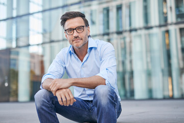 Portrait of relaxed businessman outdoors