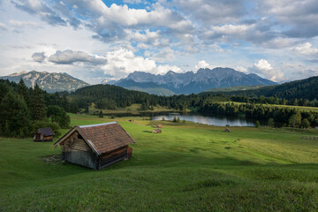 Germany, Bavaria, Werdenfelser Land, lake Geroldsee with hay barn, in background the Karwendel...