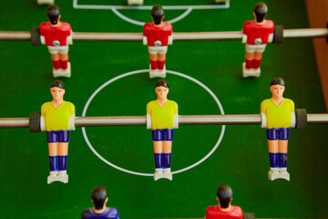 Foosball board game closeup, sports foosball board game