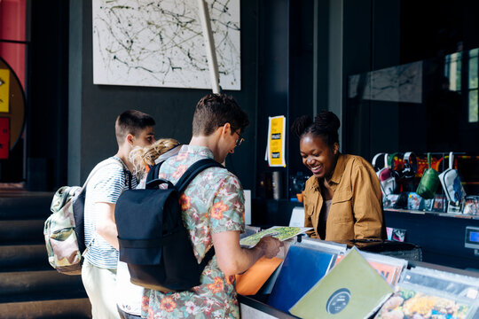 Students in record store shopping for vinyls