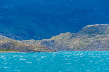 Impressive mountain view, during a hike from Refugio Grey to Paine grande, along lake grey in...