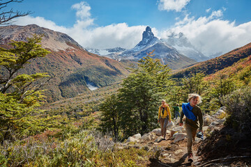 Chile, Cerro Castillo, mother with two sons on a hiking trip in the mountains