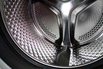 Close-Up View Inside a Washing Machine Drum for Household Laundry Appliance Design