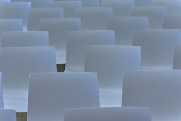 Fototapeta premium White seating in a school assembly room.