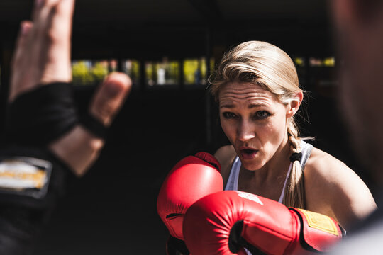 Man and woman in boxing training