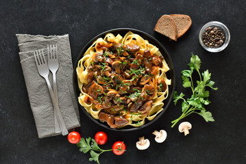  Homemade tasty beef stroganoff with mushrooms and pasta