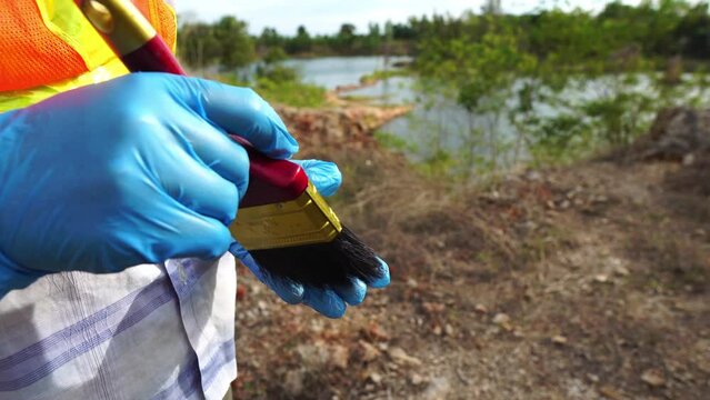 Footage 4K: Geologist working at mine exploration site