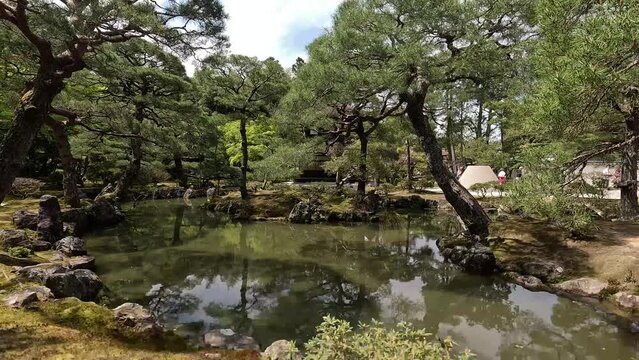 Pond And Trees At The Garden Of Ginkaku-ji Temple In Kyoto, Japan. Kogetsudai In Distance. sideways shot