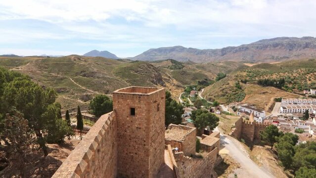 The Alcazaba of Antequera is a Muslim fortress with uncertain origins, built using Roman materials, and declared a Site of Cultural Interest in 1985. It has three towers.