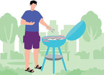 The boy is barbecuing in the park.