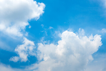 Tropical summer blue sky fluffy white cloud summertime on light sunny day cloudscape. Clear bright blue skyline spring sunlight climate background. Heaven blue environment ecology high scenic nature.
