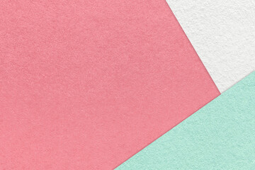 Fototapeta premium Texture of craft dark pink color paper background with white and green border. Vintage abstract rose cardboard.