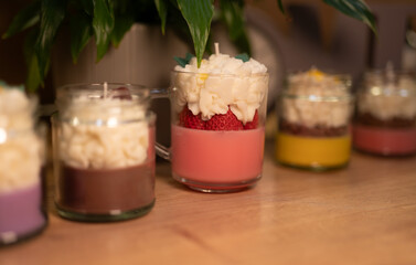 Home made candles fruit dessert in glass