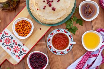 pancakes. thin pancakes or pancakes on a plate. pancakes with berries. Maslenitsa
