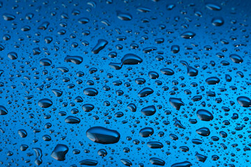 Water drops on blue reflective background - Art for decoration