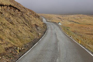 Landscapes of hills and roads in the Faroe Islands