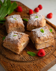Miguelitos are typical pastries from Spain made from puff pastry, filled with chocolate cream and sprinkled with sugar.