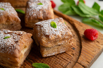 Miguelitos are typical pastries from Spain made from puff pastry, filled with chocolate cream and sprinkled with sugar.