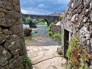 Ponte Maceira, Spain - old Roman bridge in remote village on the Camino de Santiago de Compostella