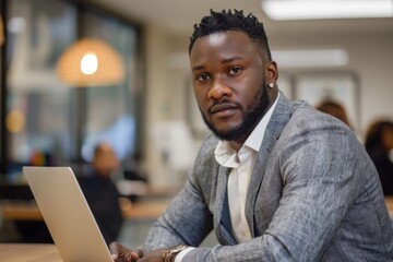Man using laptop at table