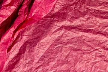 beautiful crumpled pink wrapping paper