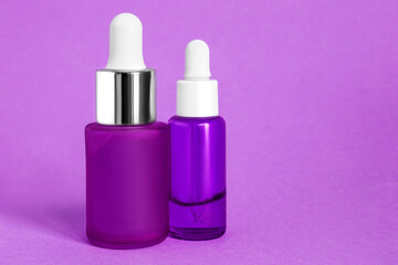 Serum bottles on purple