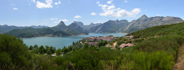 small town of Riaño in beautiful Picos de Europa National Park in Northern Spain with Riaño Lake in the foreground