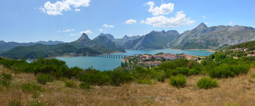 small town of Ria&ntilde;o in beautiful Picos de Europa National Park in Northern Spain with Ria&ntilde;o Lake in the foreground