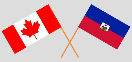 Crossed flags of Canada and Haiti. Official colors. Correct proportion