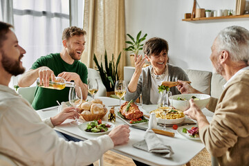 A gay couple enjoys dinner with parents.
