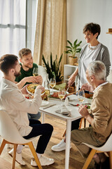 A gay couple enjoys a meal with their family at home.