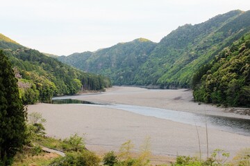 A beautiful view of the jungle and river surrounding the Kitayama River in the Wakayama prefecture of Japan.  Beautiful landscape.