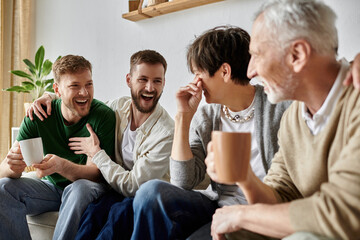 A gay couple enjoys a lighthearted moment with their family, sharing laughter and coffee at home.