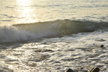 waves on the beach sunset