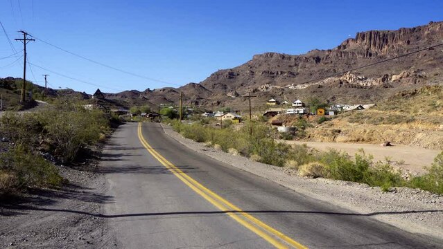 Pan right of Oatman on the historic Route 66. This former mining town is situated in the Black Mountains of Mohave County in Arizona. 4K UHD video.