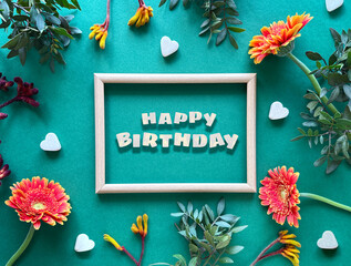 Colorful Happy Birthday Message with Flowers and Heart Decorations.