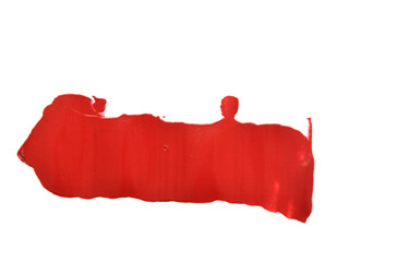 
paint stain on a white background in red color