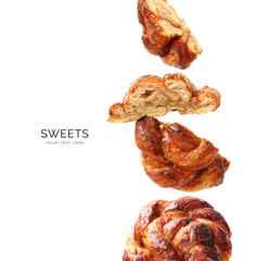 Creative layout made of sweet buns on pink background. Flat lay. Food concept. Macro  concept.