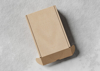 Cardboard box on top of cement floors, useful for mockup