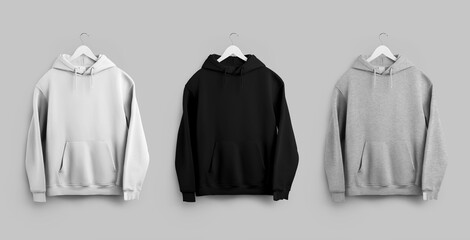 Mockup of a white, black, heather oversized hoodie on a wooden hanger, label on the sleeve, pocket, laces, front view. Set