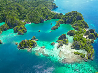 Raja Ampat, Indonesia: Aerial view of the Piaynemo viewpoint famous for its limestone karst landscape in Raja Ampat archipelago in West Papua in Indonesia.
