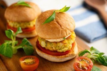 Small fish burgers with vegetables.