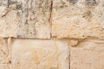 Gray and beige stone wall background