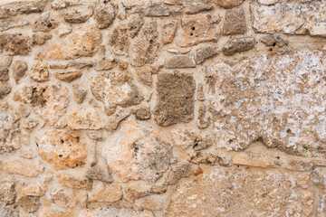 Gray and beige stone wall background