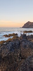 rocky shore and beautiful sunset in tenerife 