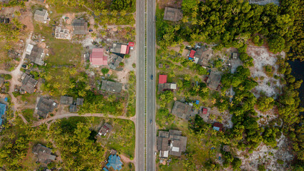 Topdown drone view of rural asphalt scenery at Pantai Jambu Bongkok, Marang, Terengganu, Malaysia