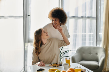 Two women enjoying a casual moment together in their home.