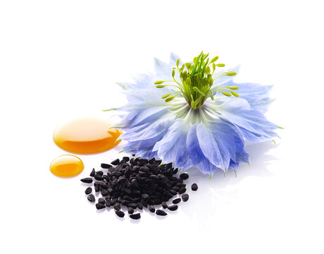 Black cumin seeds and oil drop with nigella sativa flower on white background