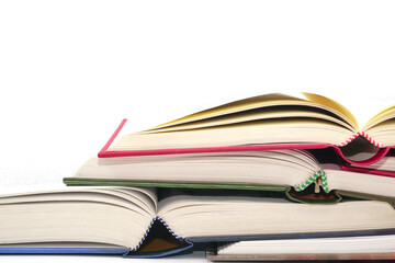 Stack of open books and stacked together. Knowledge and education concept.