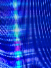 Abstract background ideal for design. Moving lights background. Blue and pink violet blur background with twinkling lights. This is a blurred photography. Blue background lines pattern